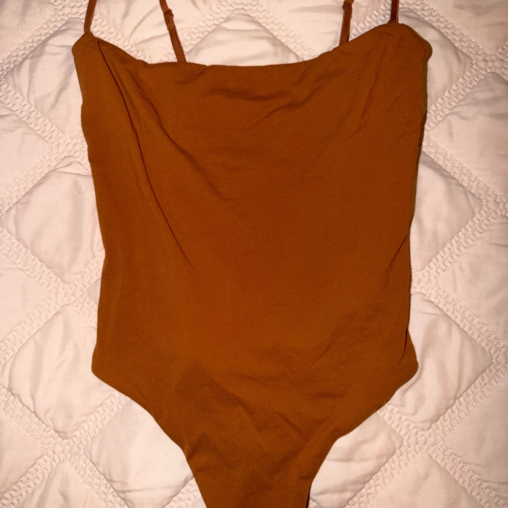 SKIMS One-Piece Bodysuit in Rust